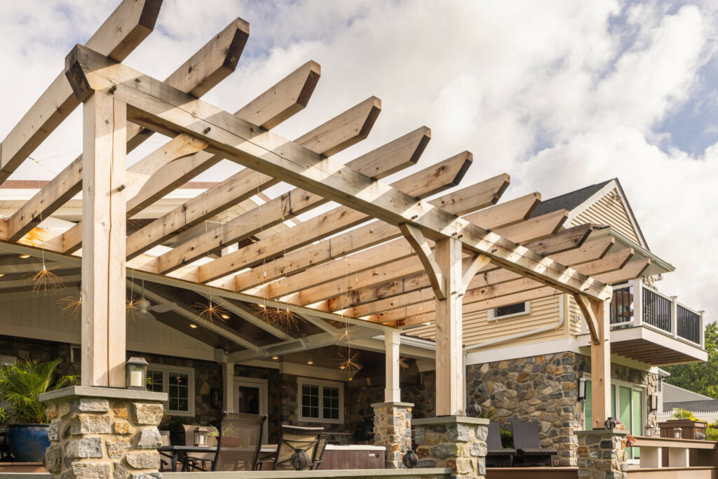 Deck with pergola on stone columns